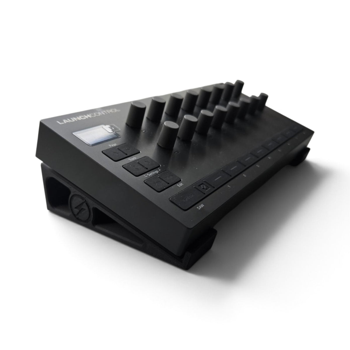 Black stand holding a Launch Control device, knobbed top and labeled controls